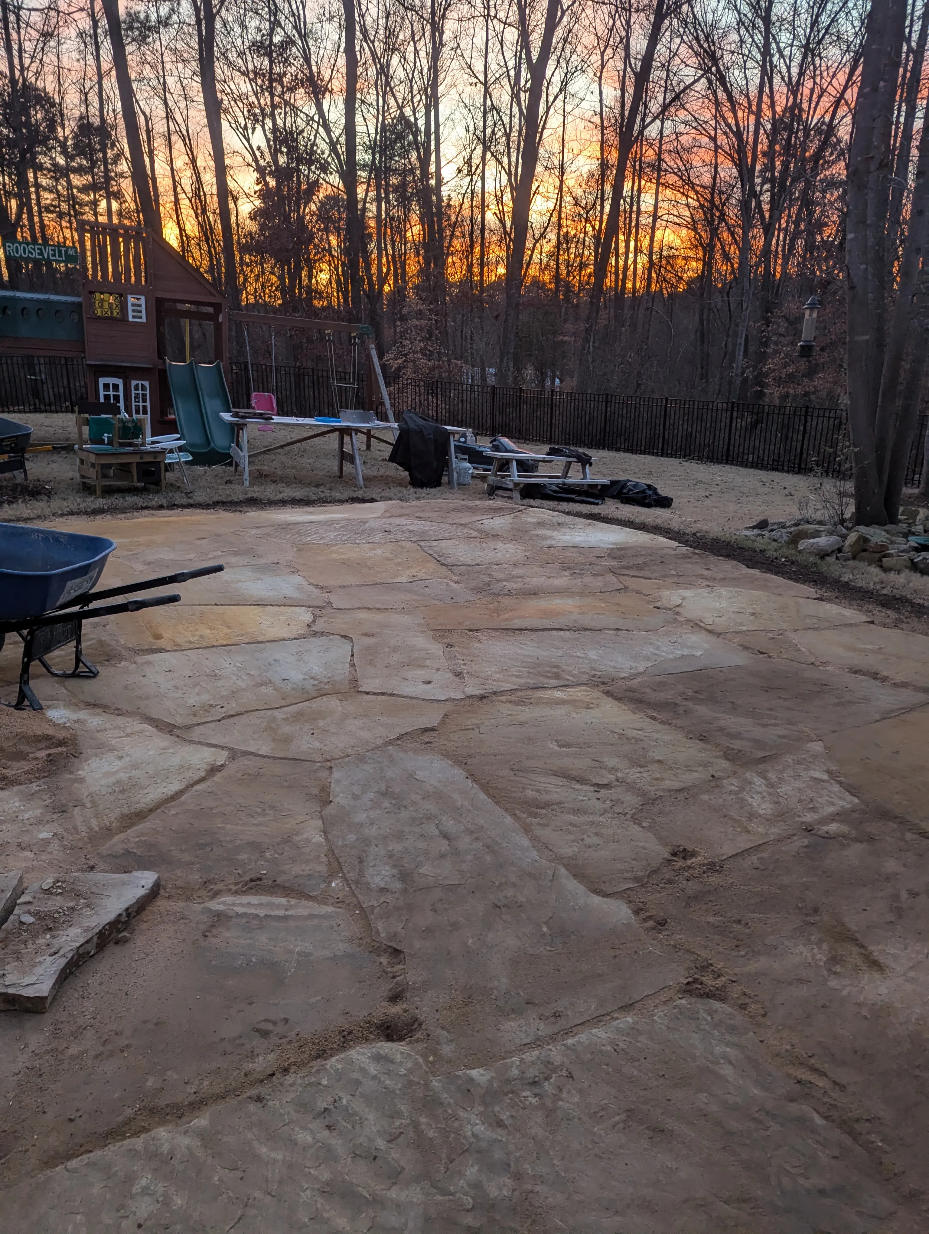 Custom flagstone patio with individually fitted irregular stone and tight joints