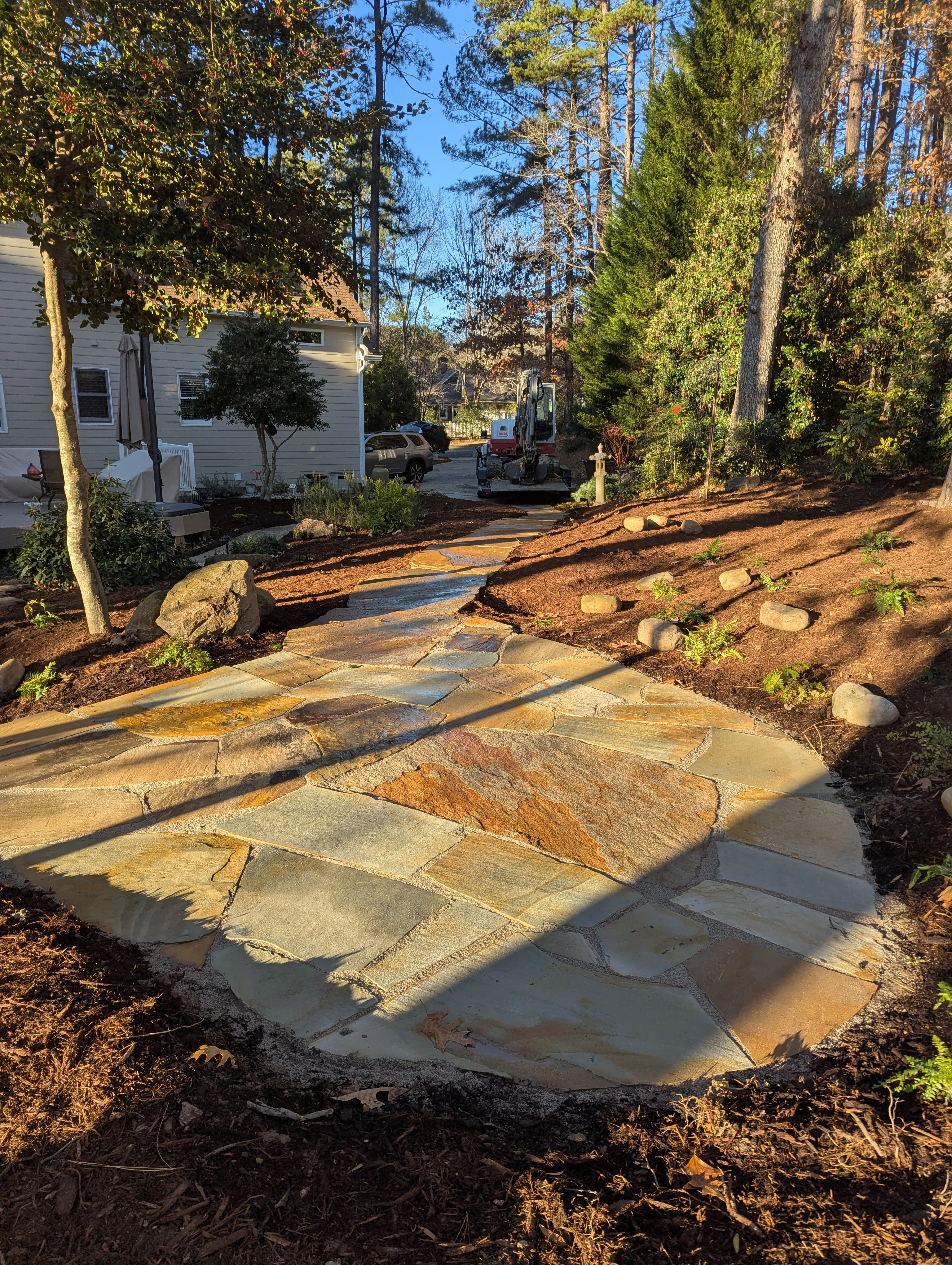 Large flagstone patio installed in a Chapel Hill backyard