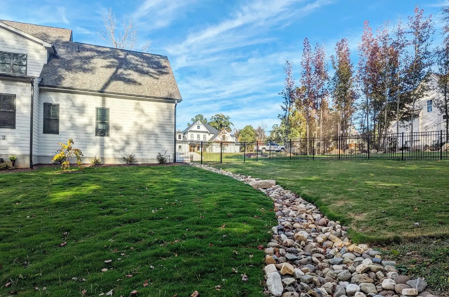 A natural stone creek bed in a residential setting